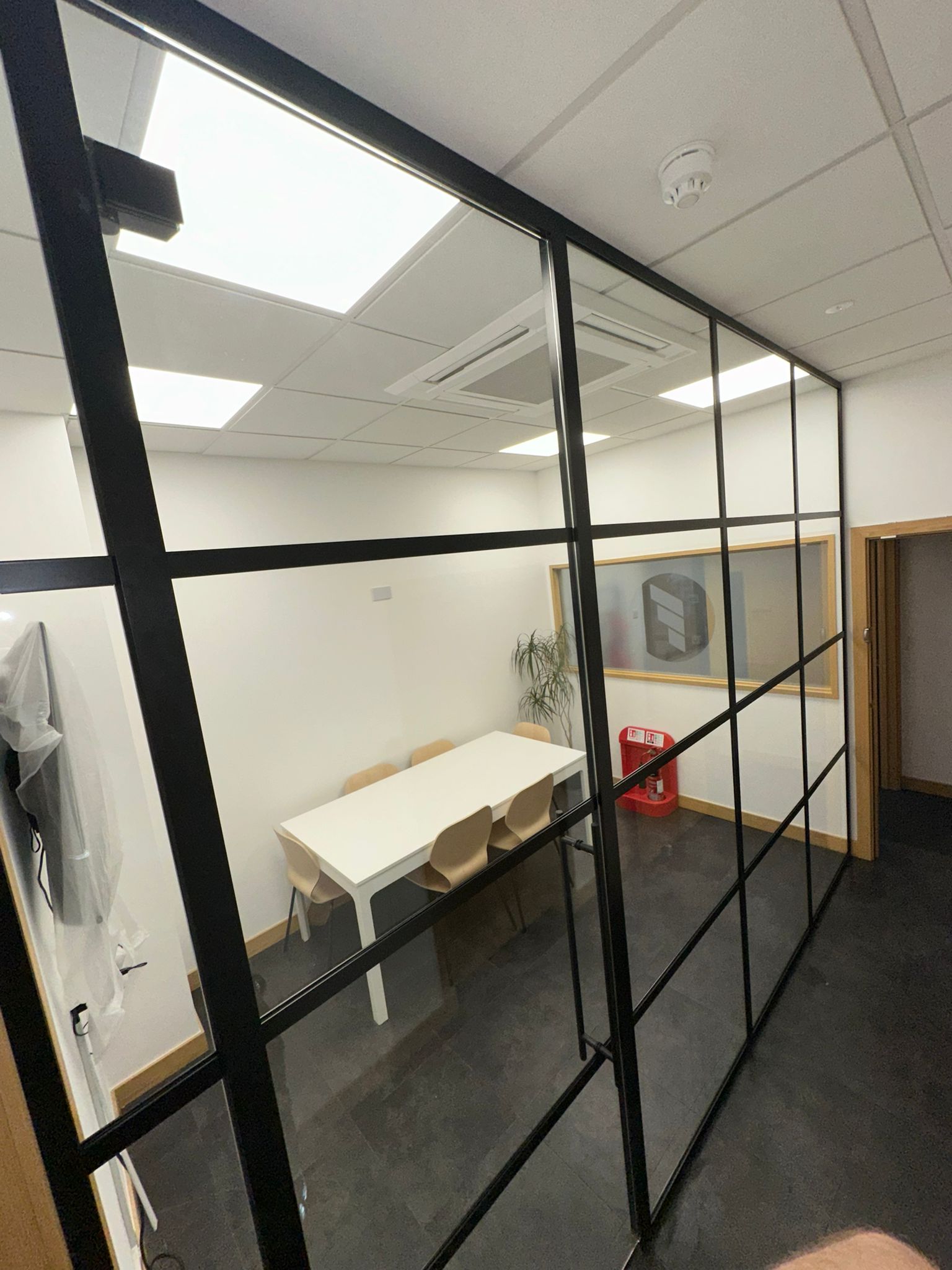 Banded glass partition